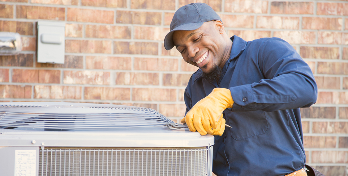 Happy HVAC technician